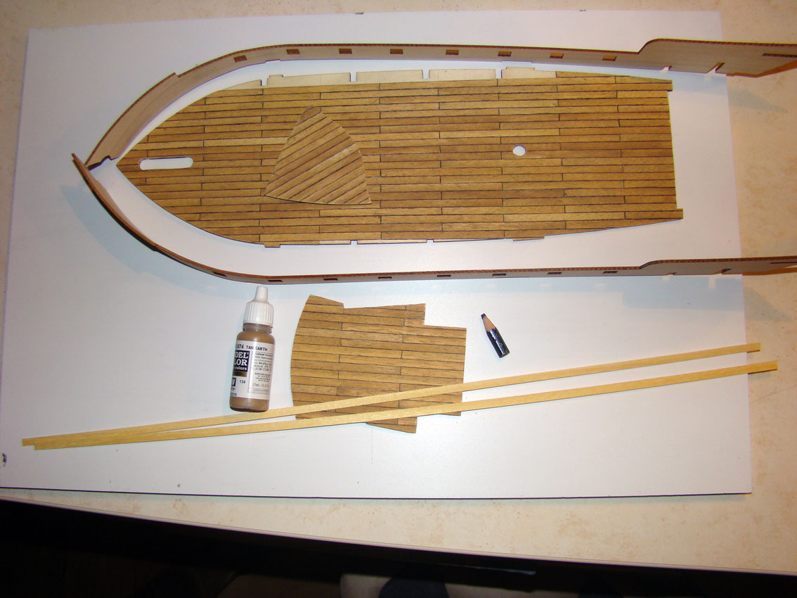 poklady.jpg (168.17 KiB) Przejrzano 10626 razy pomalowane przed kołkowaniem, i wyprofilowane "bulwarks" czy ktoś podpowie polską nazwę?<br />Kiedyś znalazłem, że to bunkry, ale nie bardzo mi pasuje.